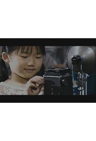 이상한 마을의 사진사 J