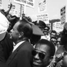 크기변환_Joseph Mankiewicz and James Baldwin merging with the crowd ⓒ Dan Budnik, All Rights Reserved.jpg